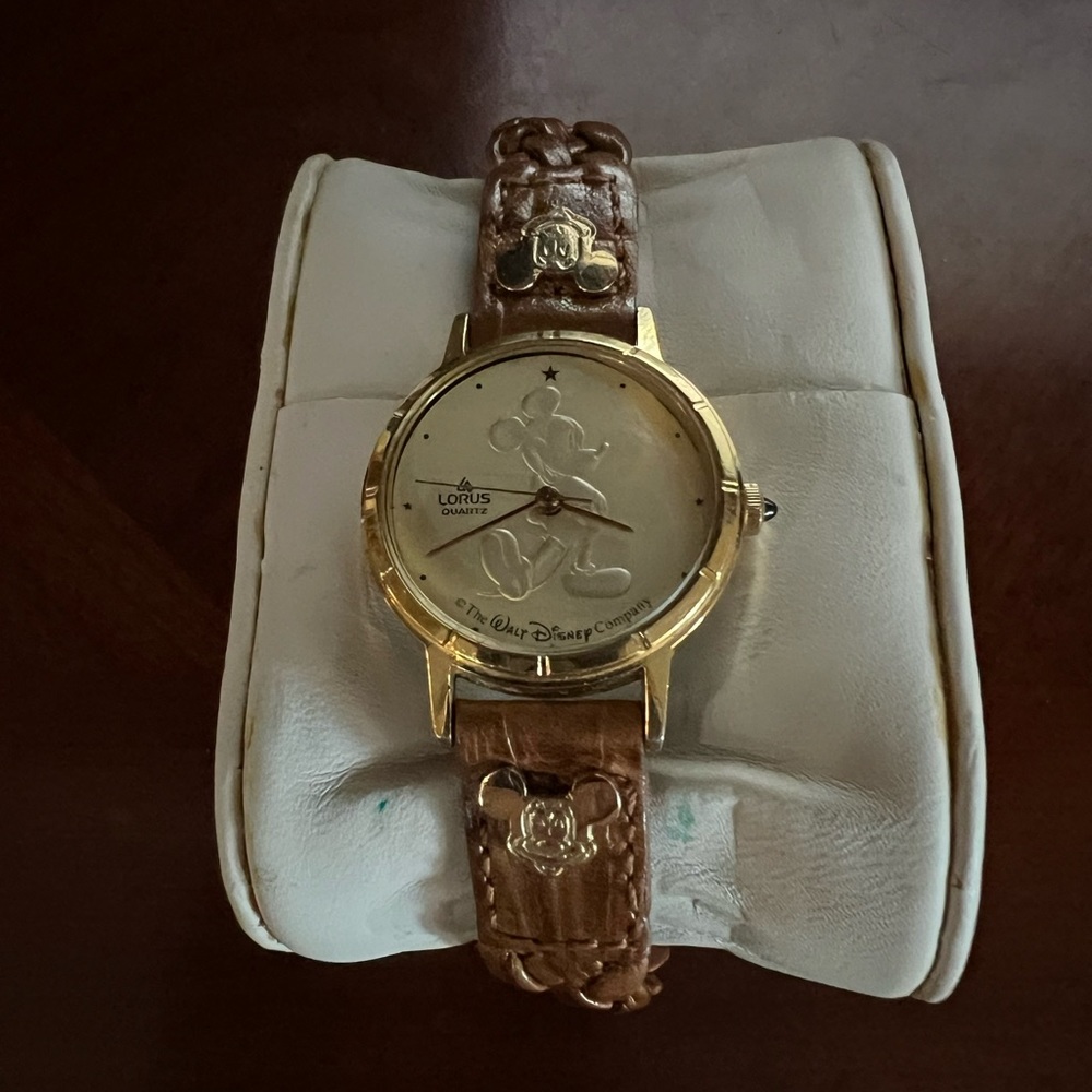 Ladies Mickey Mouse watch by Lorus. Band in great condition
